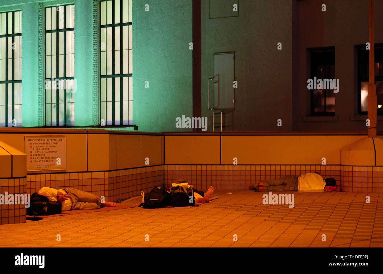 Street people sleeping on the crossover bridge near Ueno station. Stock Photo