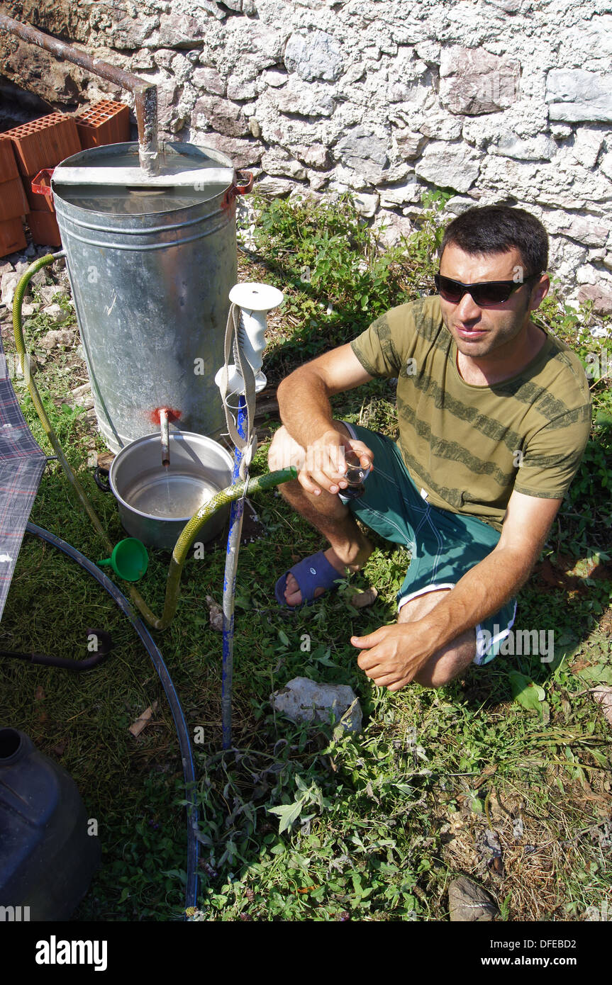 Making raki in Thethi village, Albania Stock Photo - Alamy