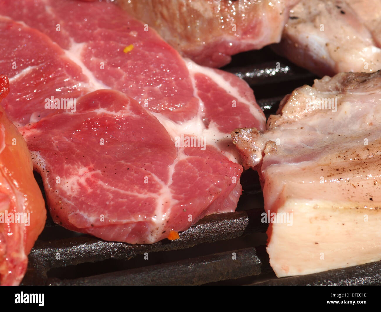 grilled pork meat on the barbeque Stock Photo