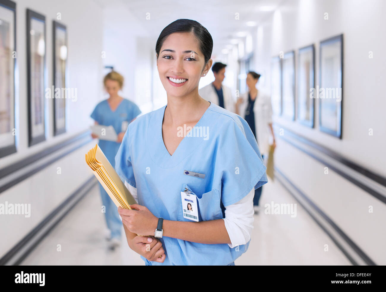 Portrait young nurse in scrubs hi-res stock photography and images - Alamy