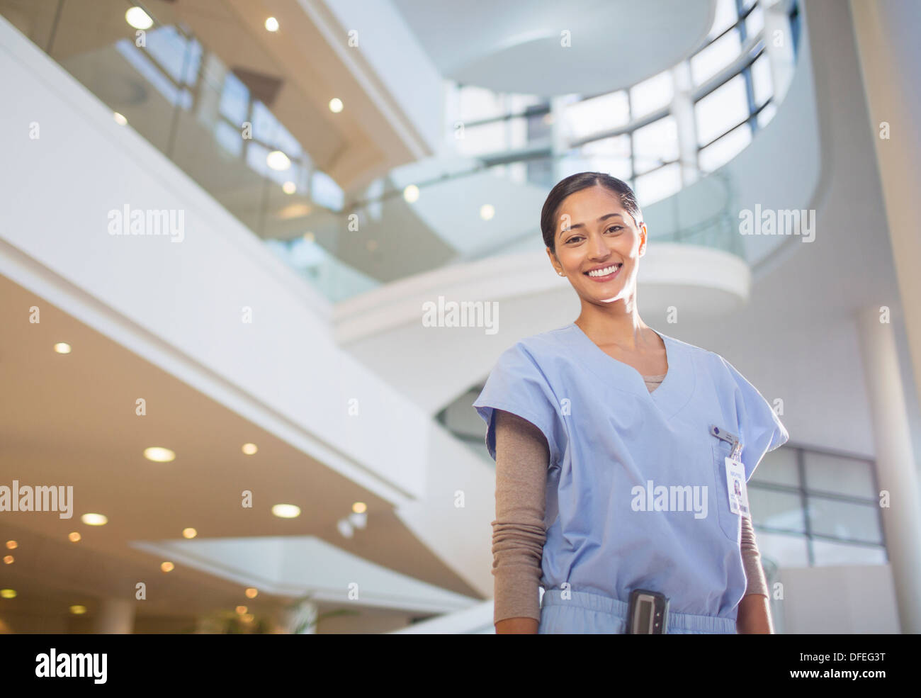 Portrait young nurse in scrubs hi-res stock photography and images - Alamy