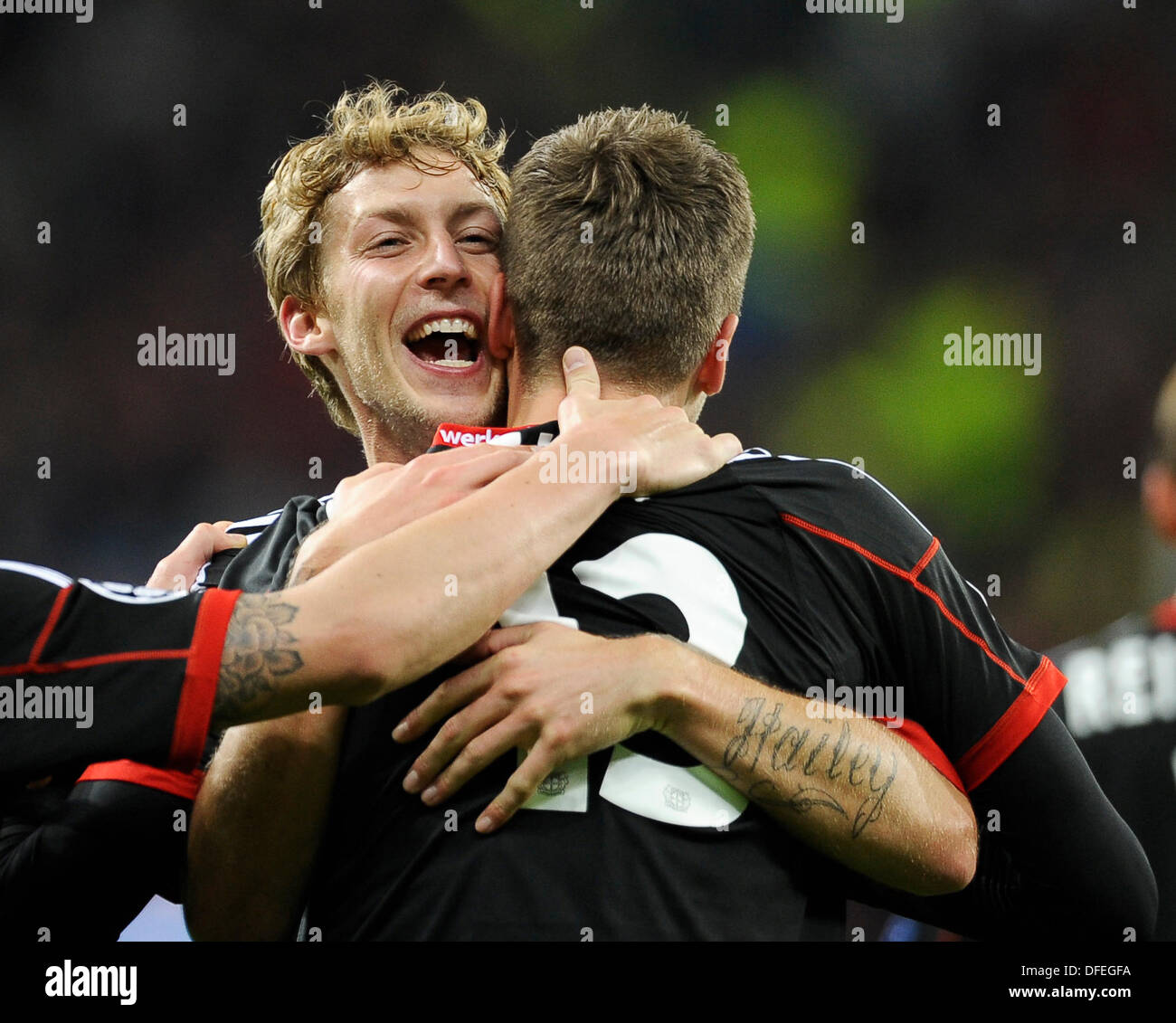 Leverkusen, Germany, 1st October, 2014. UEFA Champions League 2014/2015  Group stage Group C matchday 2, Bayer 04 Leverkusen (red) - Benfica  Lissabon (black) --- Heung-Min Son (Leverkusen) and Stefan Kie§ling  (Kiessling) (Leverkusen)