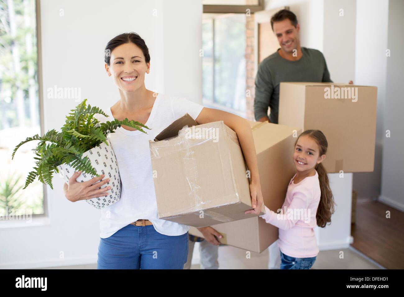 Family moving into new house Stock Photo