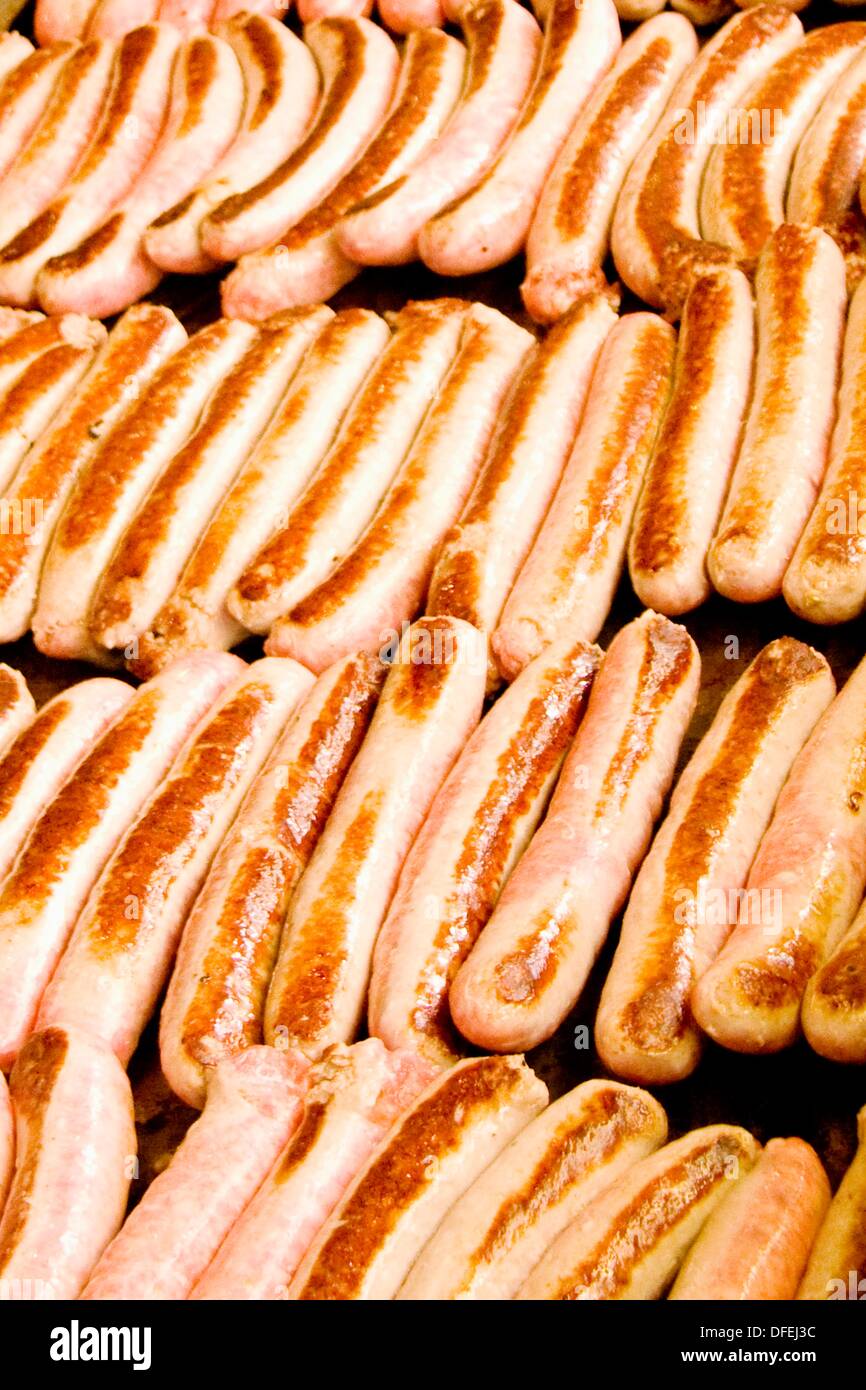 sausages grilling at stadium Stock Photo Alamy