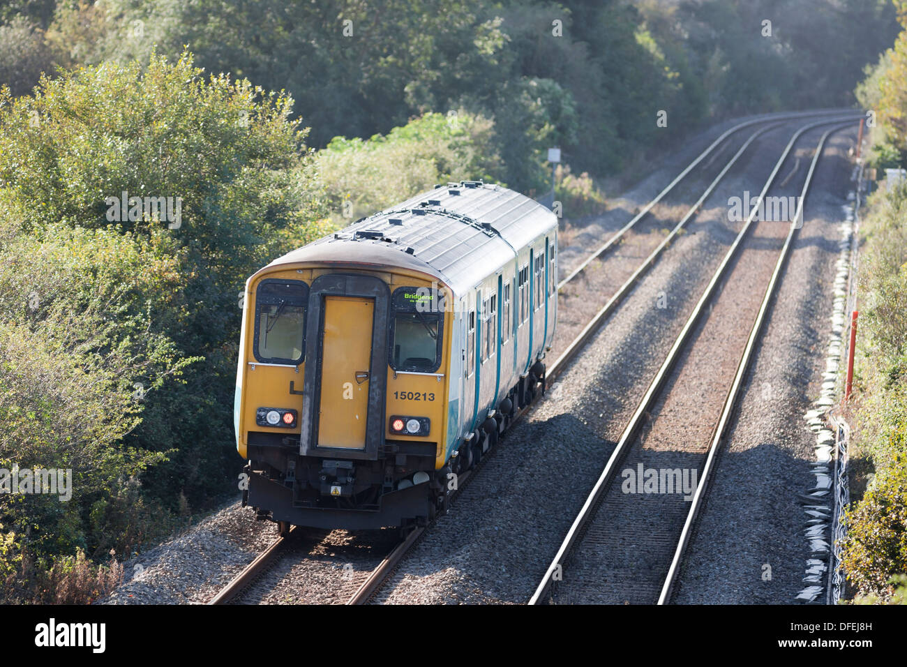 regional diesel train running on tracks Stock Photo Alamy