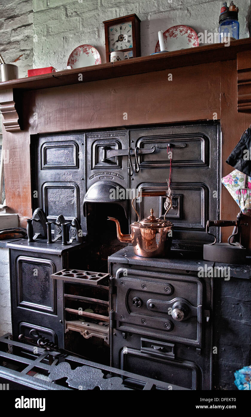 Cast iron open fire cooking range from the 1800's early 1900's. Black Country Museum Dudley West Midlands England UK Stock Photo