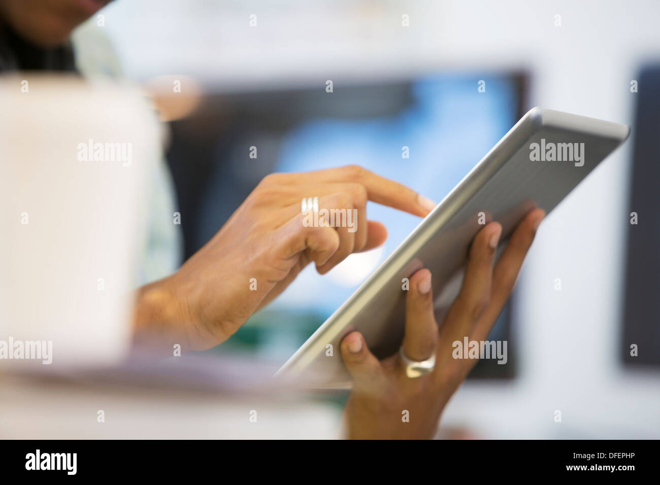 Close up of businessman using digital tablet Stock Photo