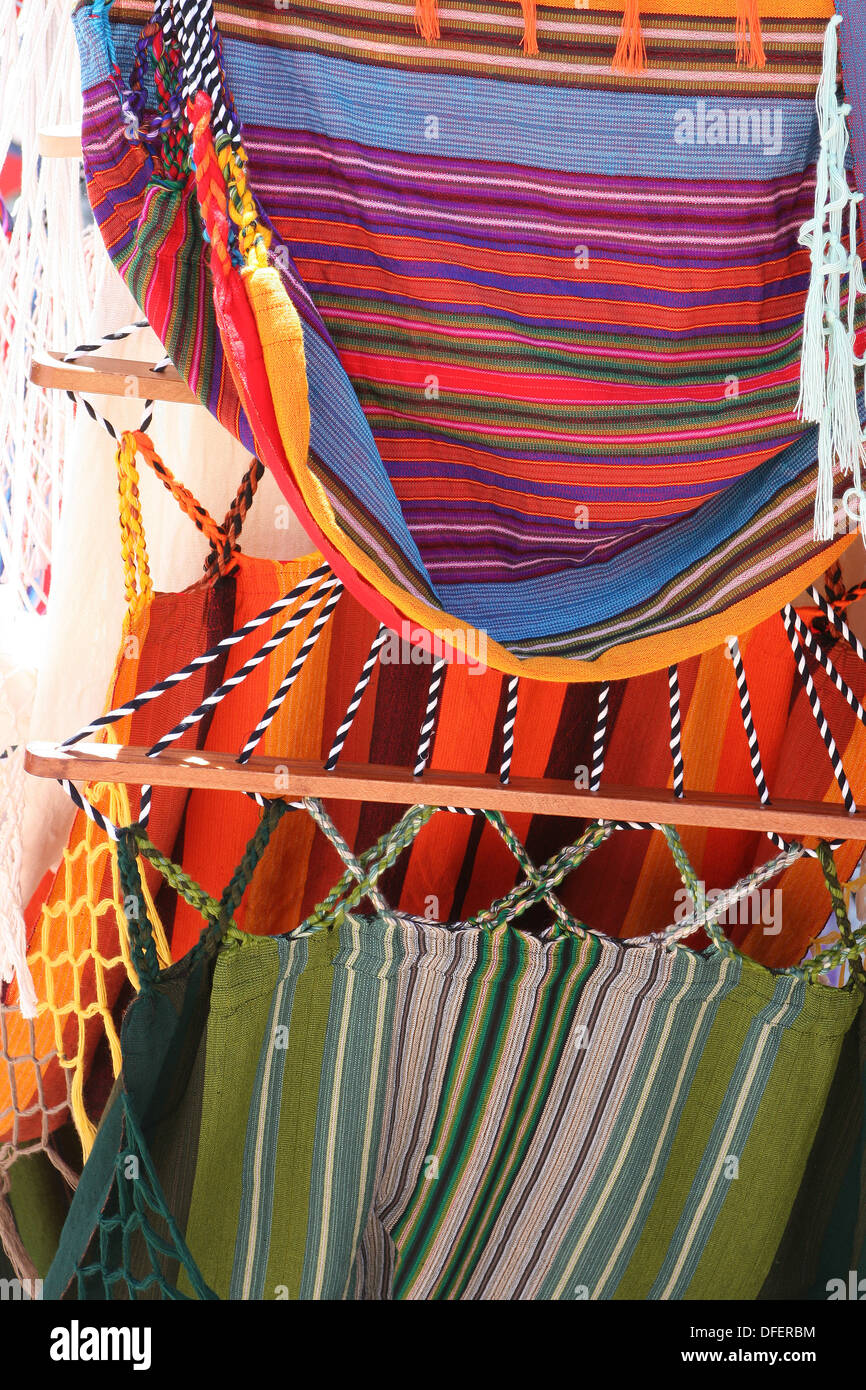 Colorful handmade hammocks for sale at the outdoor craft market in