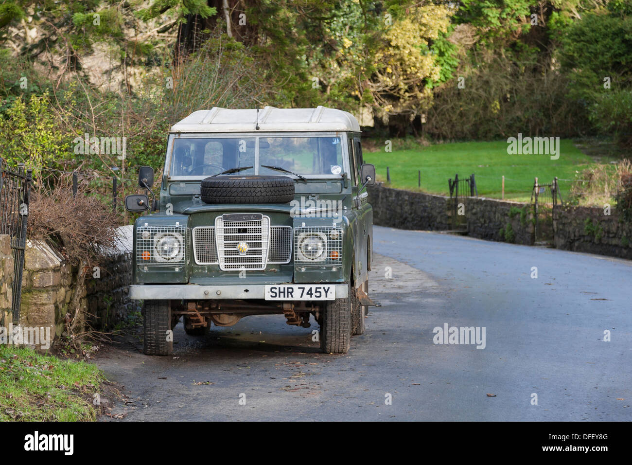 old land rover in country lane Stock Photo