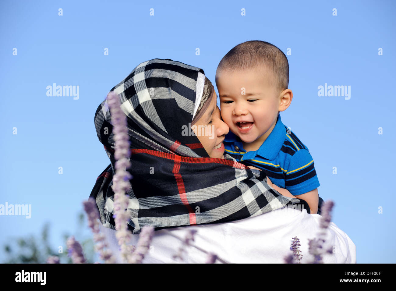Outdoor portrait of of happy mother and Child Stock Photo