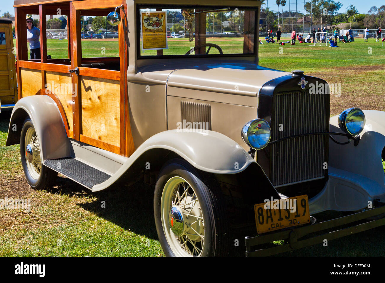 Front 3/4 view of a classic 1930 Chevrolet 'woody' station wagon. Stock Photo