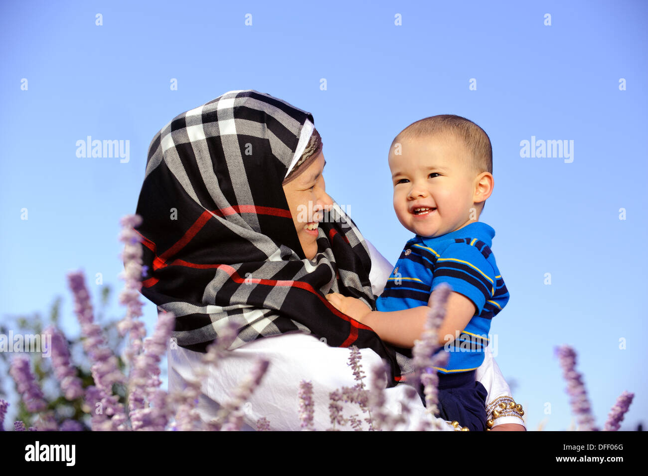 Outdoor portrait of of happy mother and Child Stock Photo