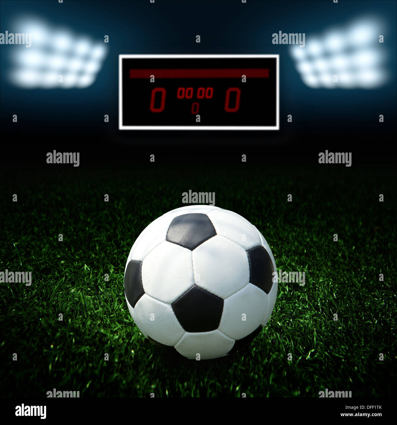 soccer ball on the green field Stock Photo