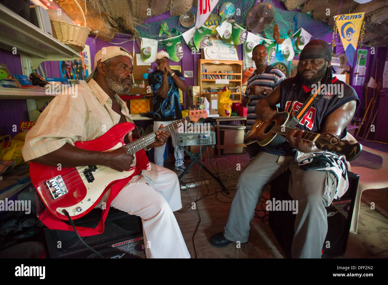 Local band jamming in The Monkey Bar, Little Bay, Montserrat Stock Photo