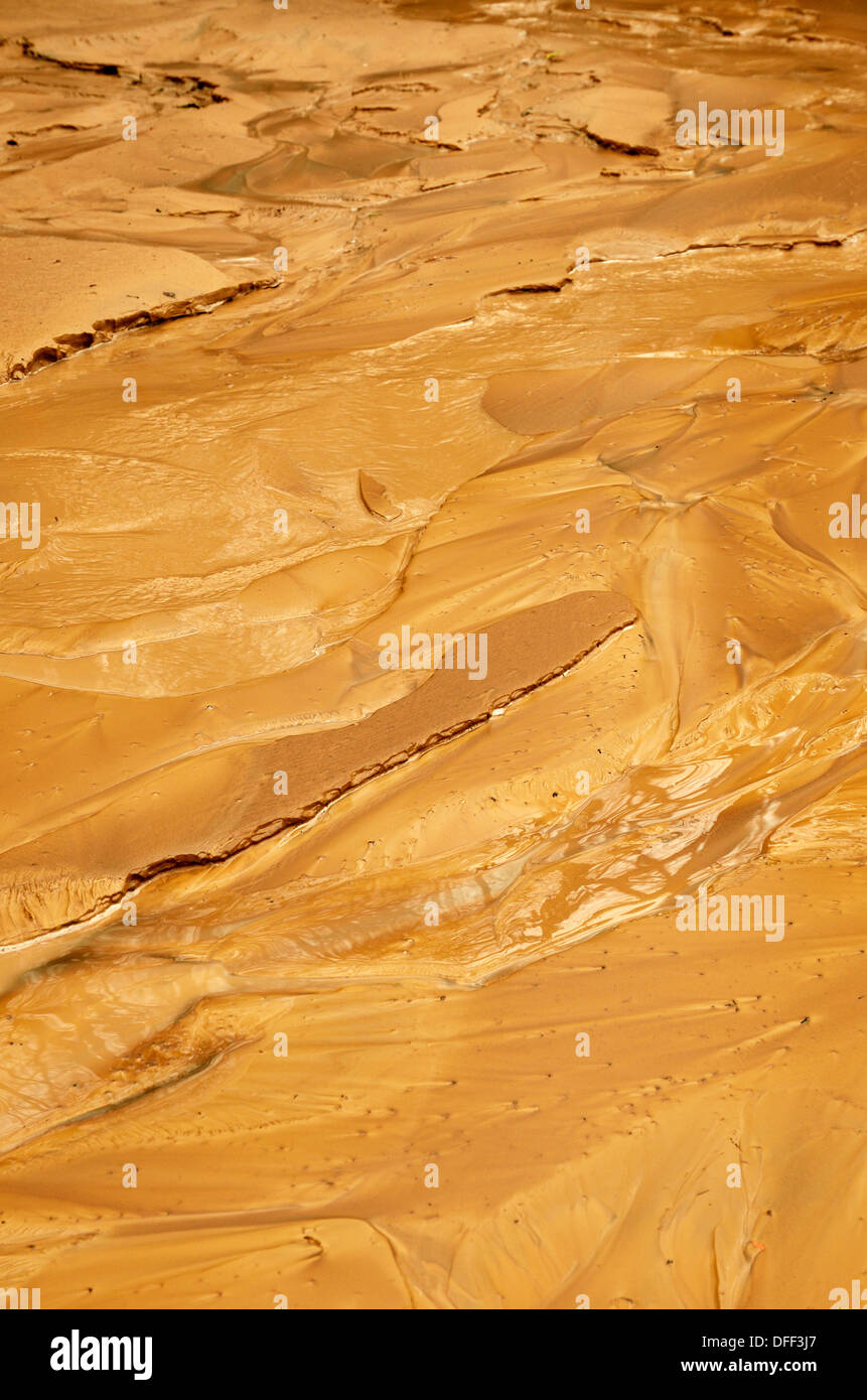 Yellow wet clay sediment Stock Photo