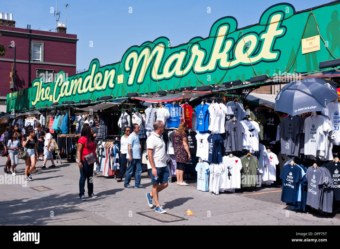 People walk past the Camden Market in London on August 21, 2013. Stock Photo