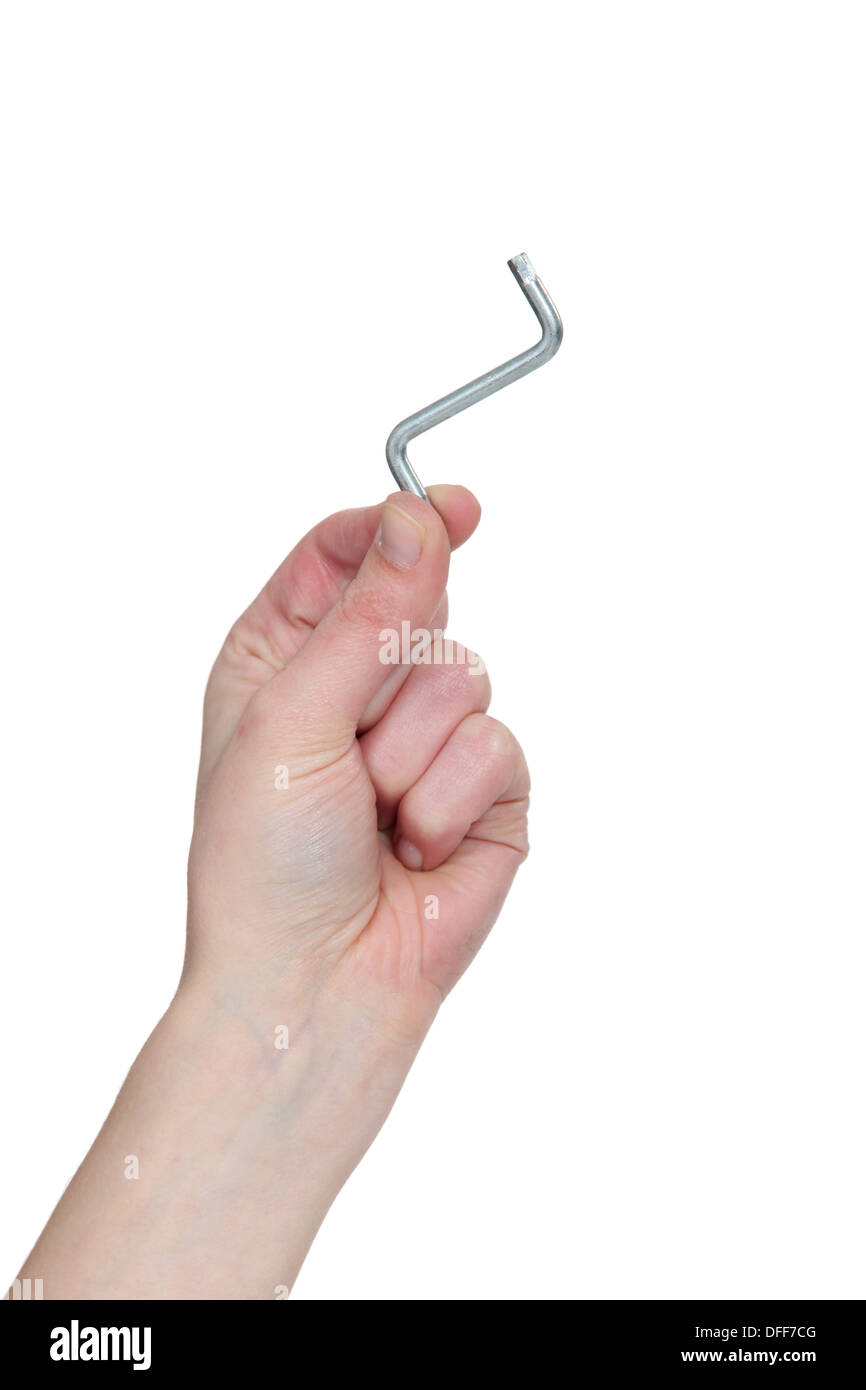 Hand with allen key Stock Photo