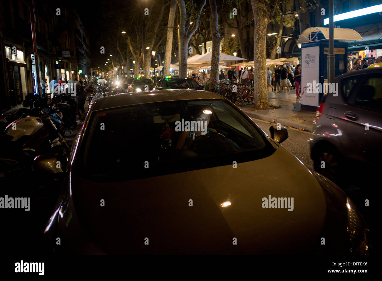 Barcelona, Spain- 03 October, 2013. A woman with the car stopped at the ...