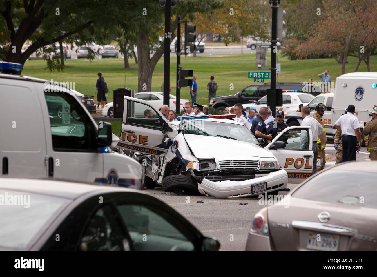 Washington, DC, USA. 3rd Oct, 2013:  US Secret Service and Capitol Police chase a woman who tried to ram security gate at the White House with her car.  A car chase ensues from the White House to the US Capitol building.  The chase ends in a crash, shots are fired by Capitol Police.  The woman driver is confirmed dead, a Capitol Policeman is injured. © B Christopher/Alamy Live News Stock Photo