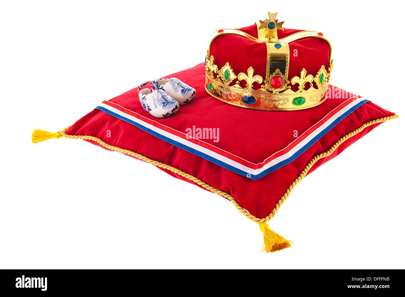 Golden crown on red velvet pillow for coronation Stock Photo - Alamy