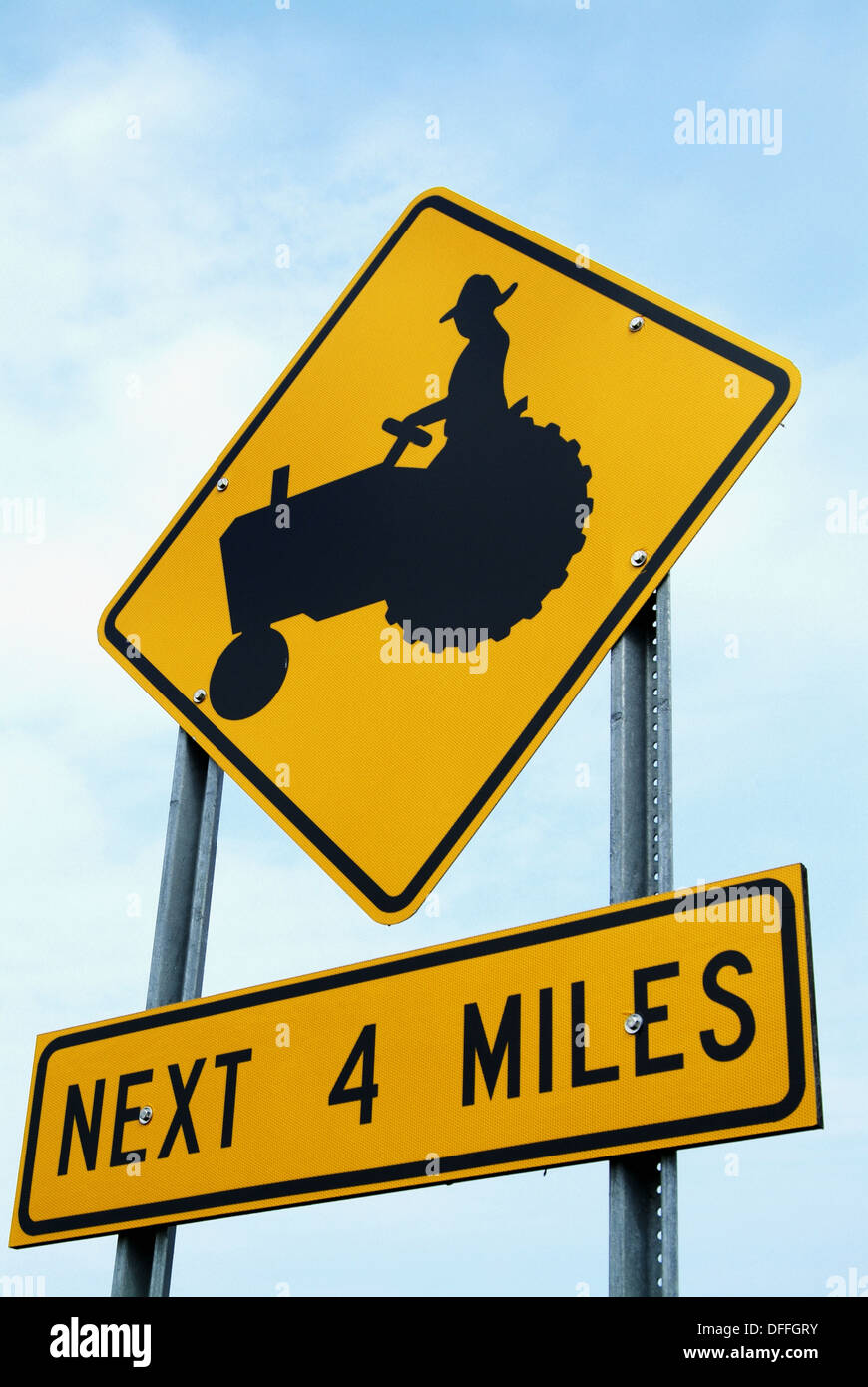Traffic sign warning drivers of possible farm tractor drivers in the