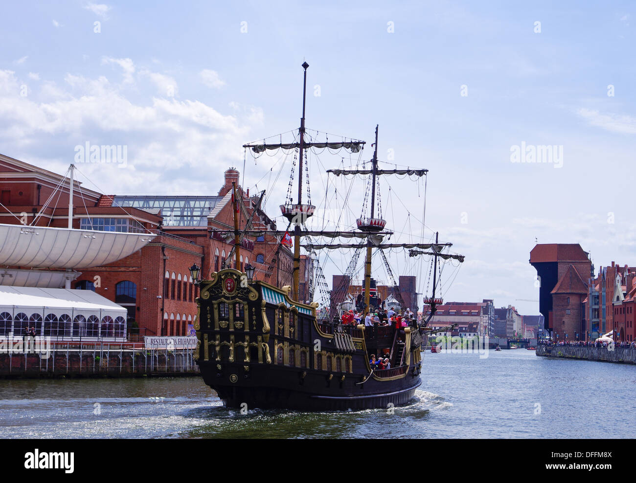 A tourist ship cruising on the Motlawa River in the Gdansk city center in Poland Stock Photo