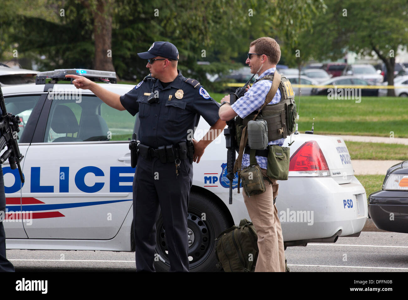 Washington, DC, USA. 3rd Oct, 2013:  US Secret Service and Capitol Police chase a woman who tried to ram security gate at the White House with her car.  A car chase ensues from the White House to the US Capitol building.  The chase ends in a crash, shots are fired by Capitol Police.  The woman driver is confirmed dead, a Capitol Policeman is injured. © B Christopher/Alamy Live News Stock Photo