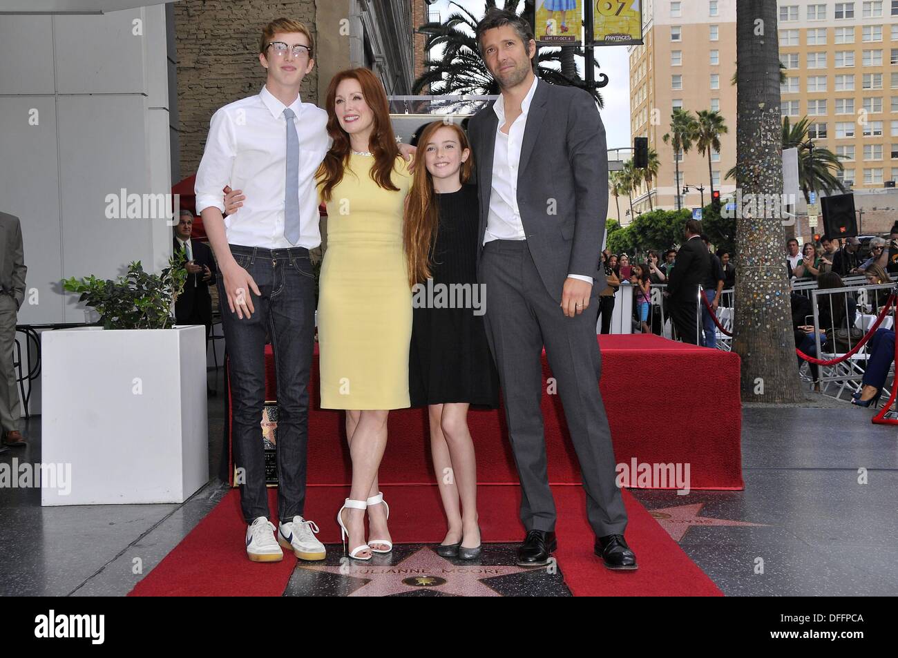Los Angeles, CA. 3rd Oct, 2013. Caleb Freundlich, Julianne Moore, Liv Freundlich, Bart Freundlich at the induction ceremony for Star on the Hollywood Walk of Fame for Julianne Moore, Hollywood Boulevard, Los Angeles, CA October 3, 2013. © Michael Germana/Everett Collection/Alamy Live News Stock Photo