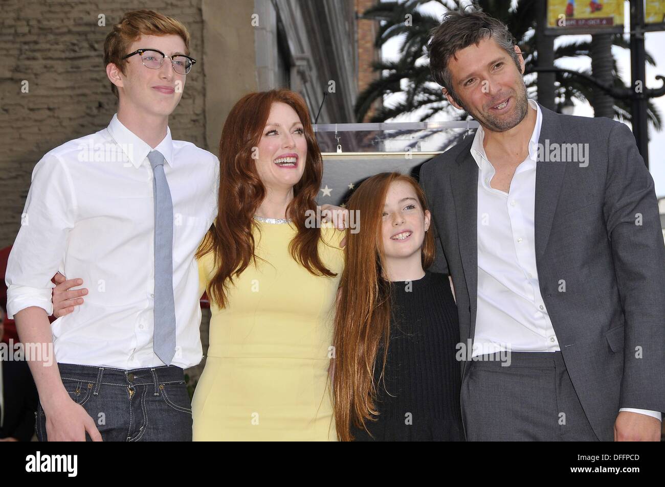 Los Angeles, CA. 3rd Oct, 2013. Caleb Freundlich, Julianne Moore, Liv Freundlich, Bart Freundlich at the induction ceremony for Star on the Hollywood Walk of Fame for Julianne Moore, Hollywood Boulevard, Los Angeles, CA October 3, 2013. © Michael Germana/Everett Collection/Alamy Live News Stock Photo
