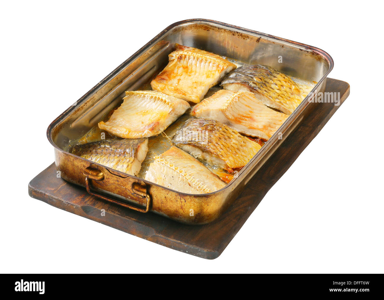 Oven baked carp fillets in baking pan Stock Photo