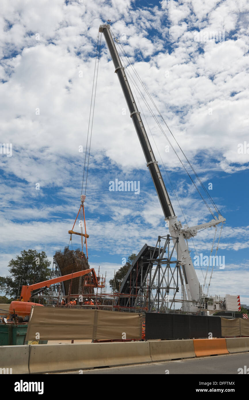 crane auto working for global road reconstruction Stock Photo Alamy