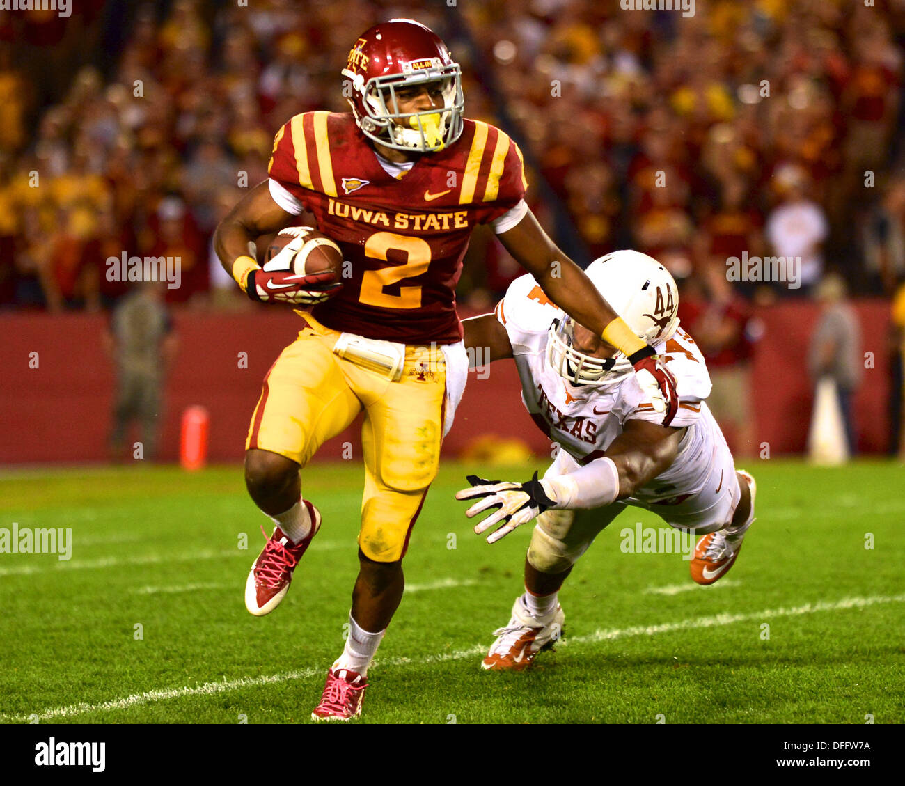 Ames, Iowa, USA. 3rd Oct, 2013. October 3rd. 2013: Iowa State RB #2 Aaron  Wimberly breaking a tackle during the NCAA football game between the Iowa  State Cyclones and the Texas Longhorns