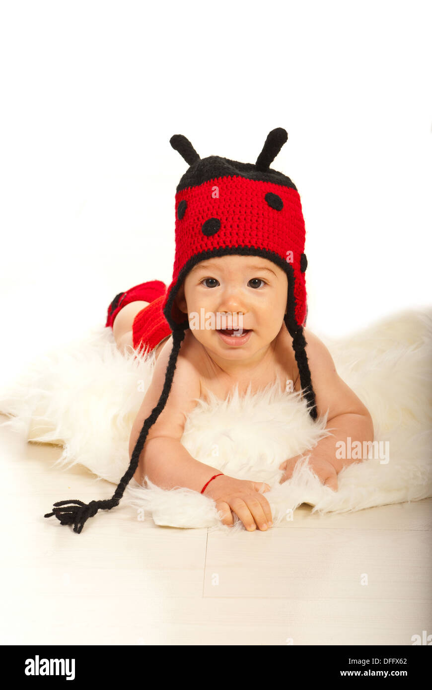 Smiling baby with fur hat hires stock photography and images Alamy