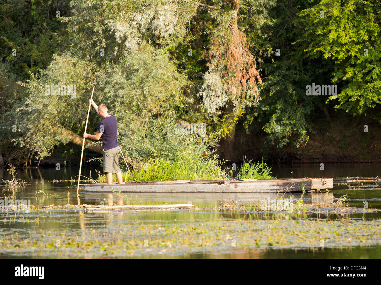 Man rowing wooden boat on hi-res stock photography and images - Alamy