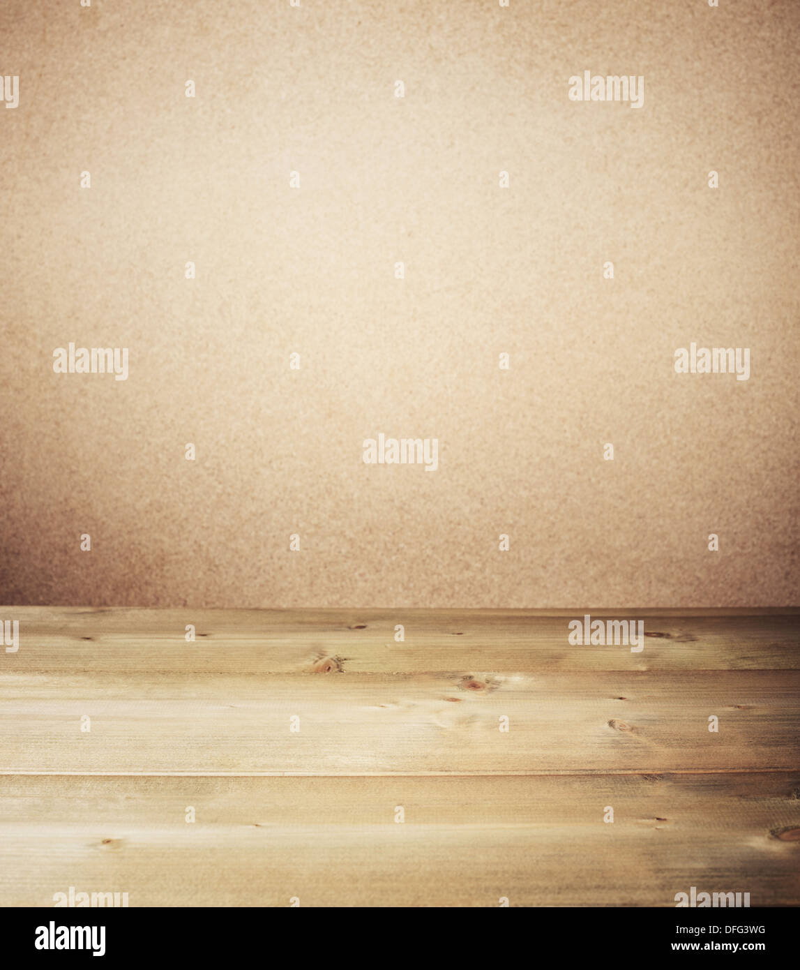 Wooden table in front of wall Stock Photo - Alamy