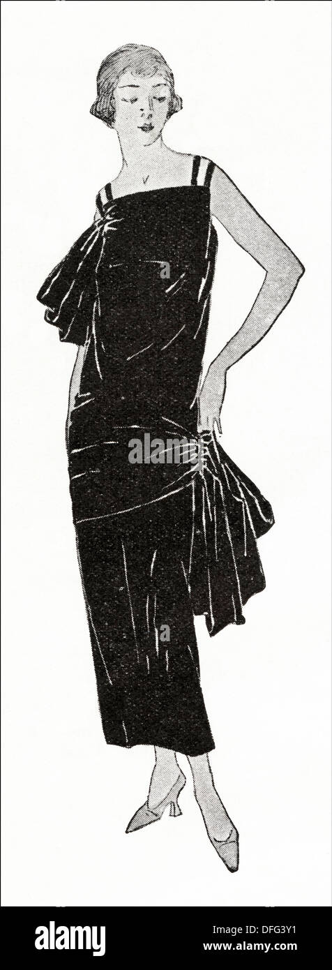 Flapper fashion of the 1920s. Gown in soft black satin with corsage shirred  into loops an the right shoulder and left hip by designer Anna (Jeanne  Hallee). Original vintage illustration from a