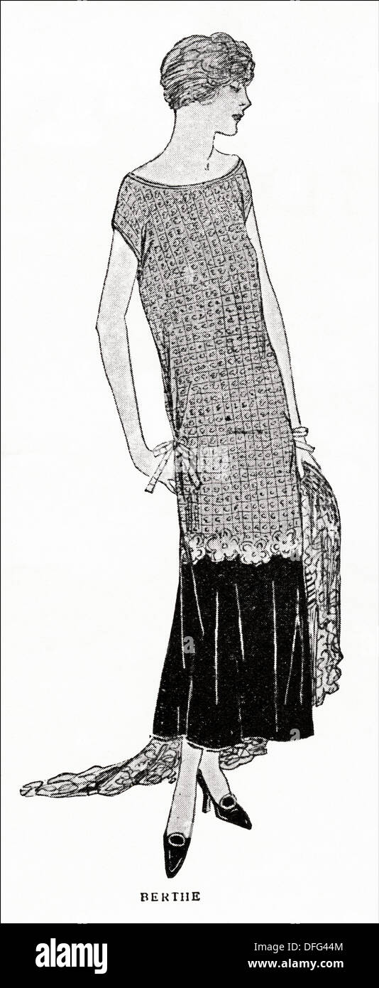 Flapper fashion of the 1920s. Printed crepe frock in red ochre and dark blue edged with a flounce of dark blue alpaca by designer Berthe. Original vintage illustration from a women's fashion magazine circa 1924 Stock Photo