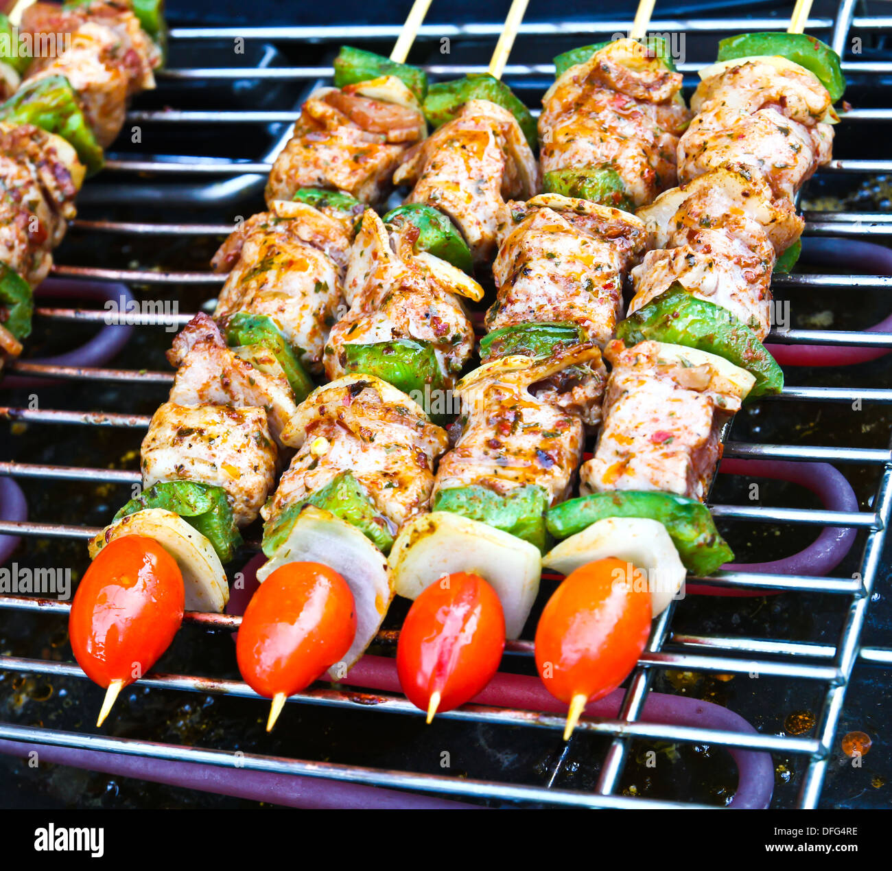 Sizzling barbecue sticks with meat and vegetables Stock Photo Alamy