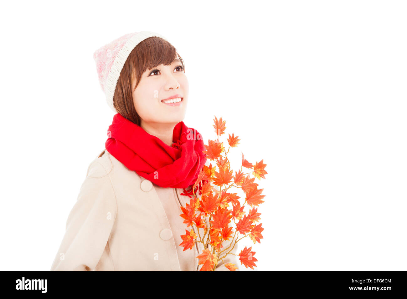 young smiling woman with yellow maple leaf Stock Photo - Alamy