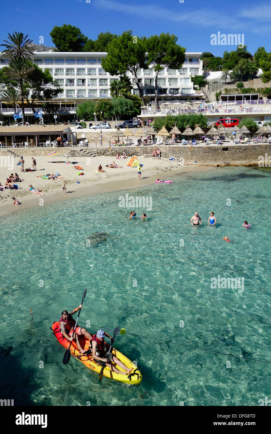 People kayaking and swimming. Cala Molins. Cala Sant Vicenç. Mallorca Island. Spain Stock Photo