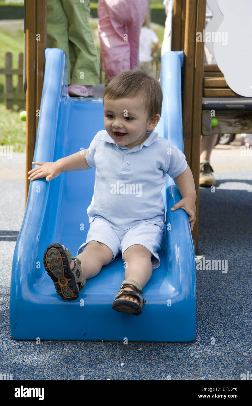 1 year old boy in playground Stock Photo Alamy