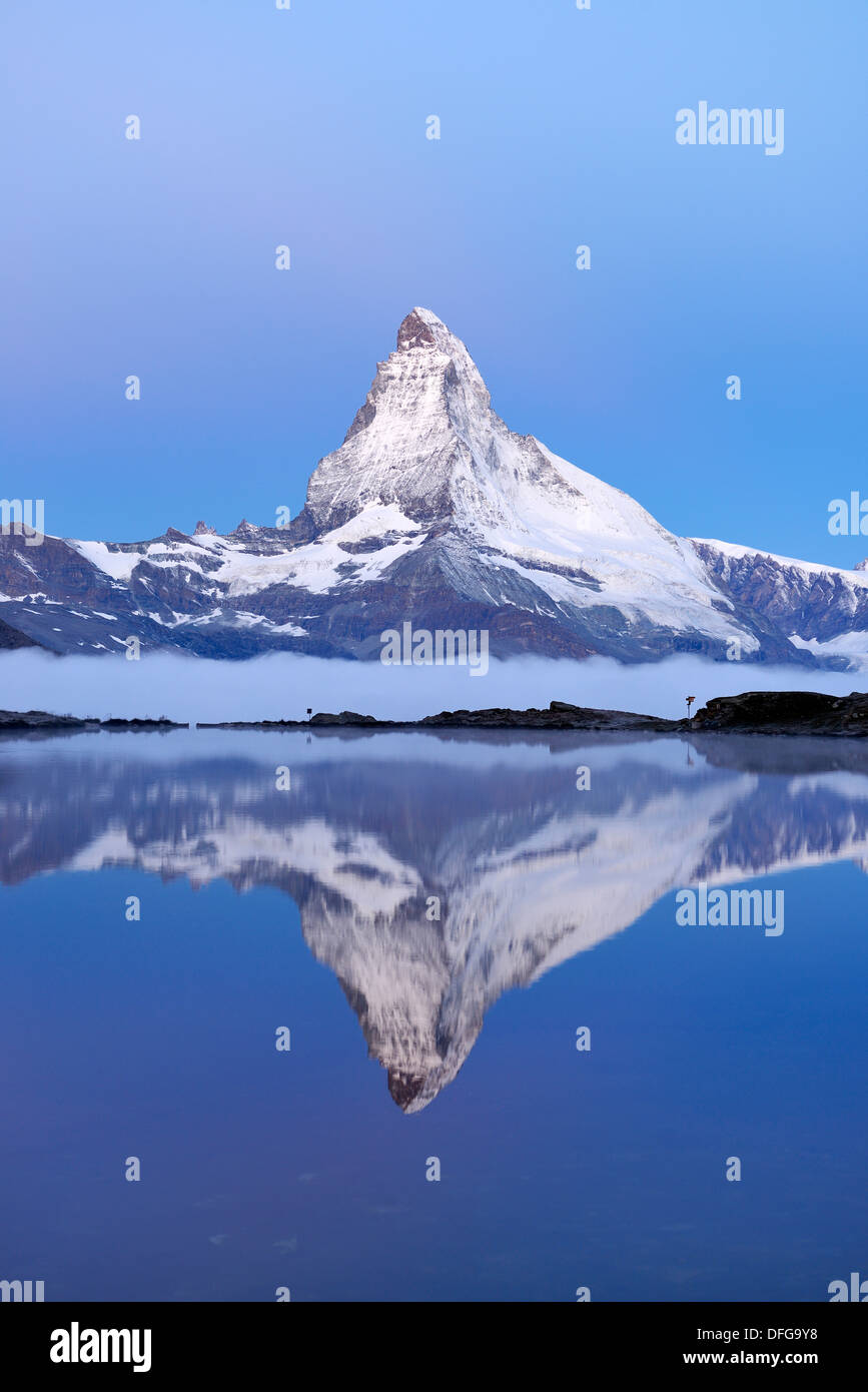 Matterhorn reflected in Lake Stellisee at dusk, Valais Alps, Canton of Valais, Switzerland Stock Photo
