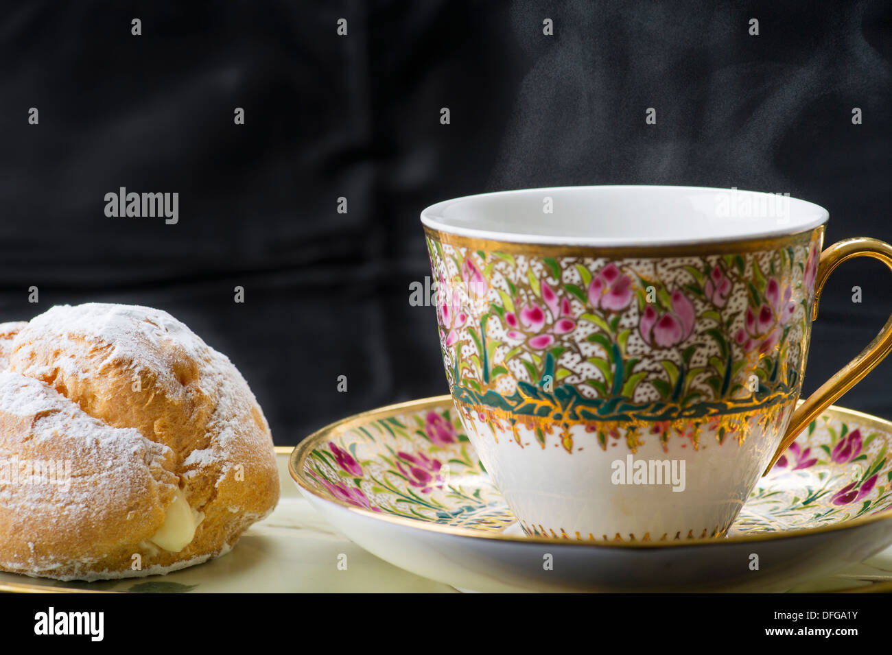 Cream bun with coffee Stock Photo