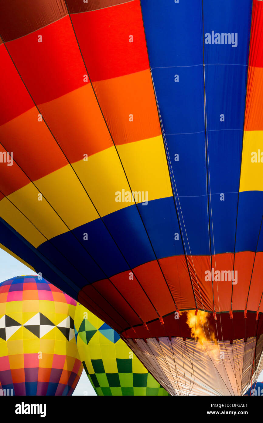 The flame of a hot air balloon burner inflates the balloon in