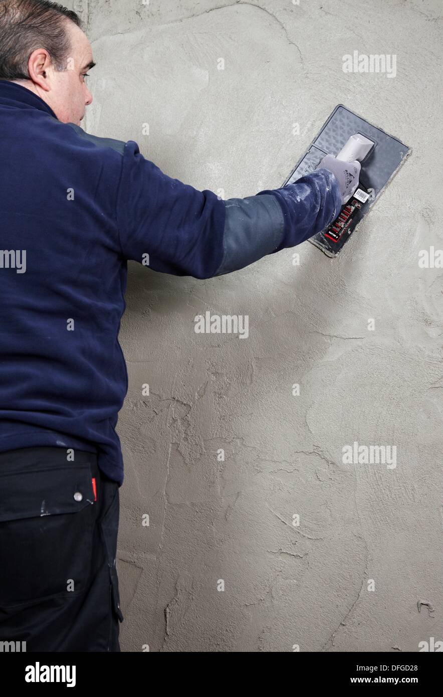 Roughcast, plastering trowel, new homes under construction