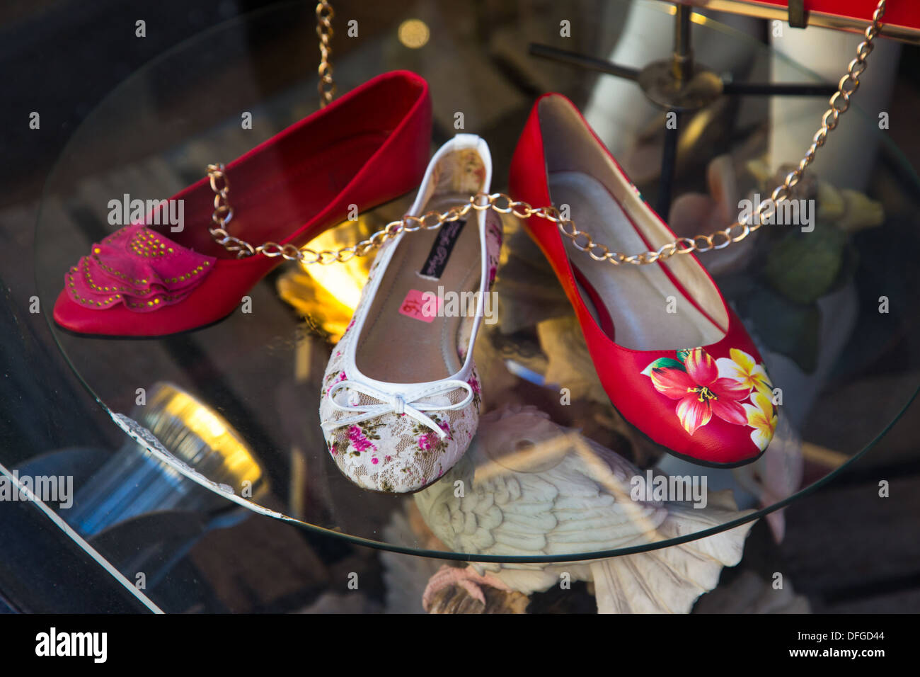 Shoes on display in a Shop Window, Brick Lane, London Stock Photo