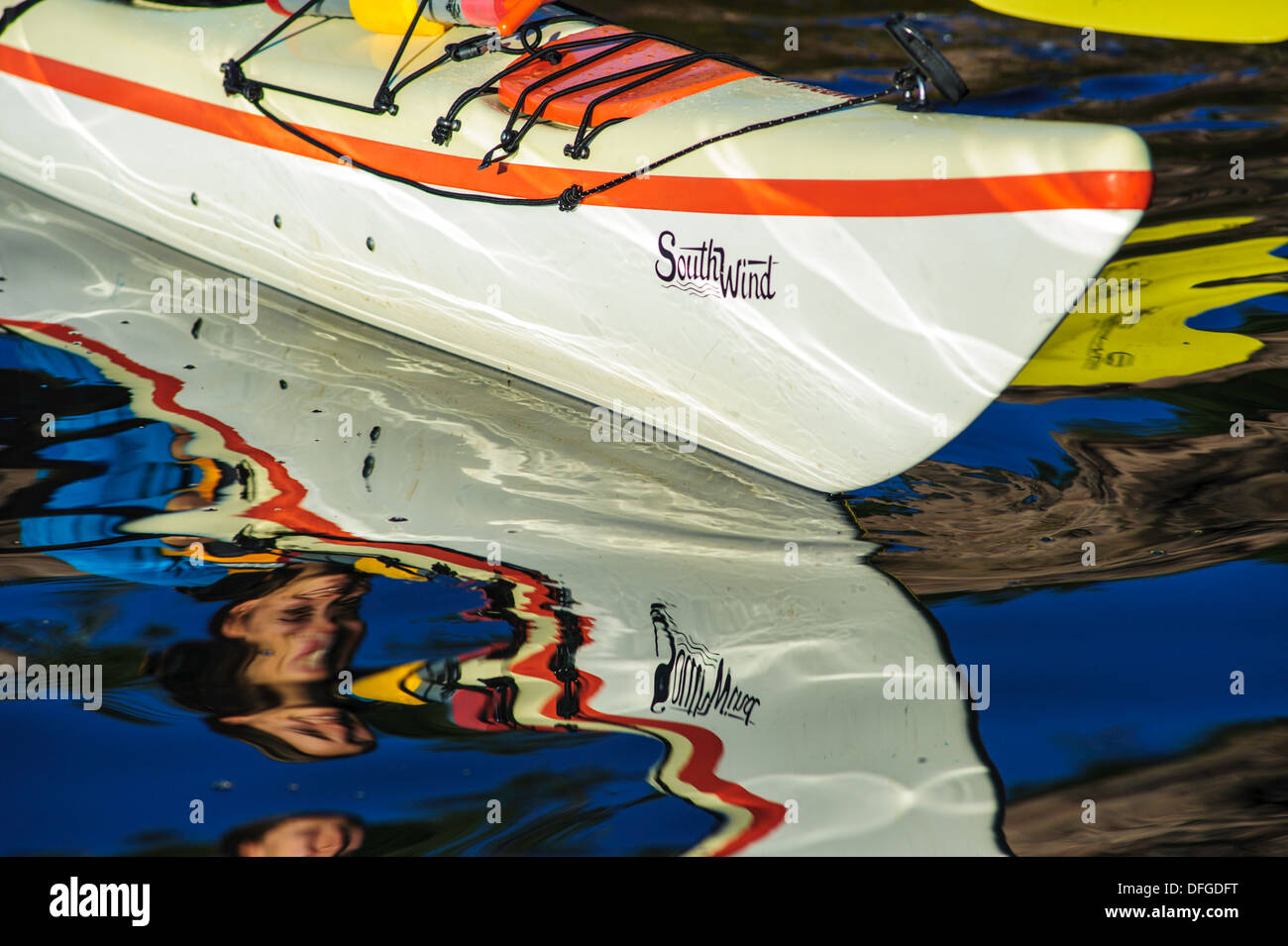 Bow of kayak reflecting in water Stock Photo