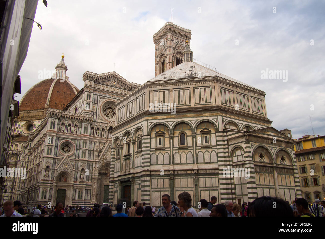 Duomo behind other building, Florence, Tuscany, Italy Stock Photo