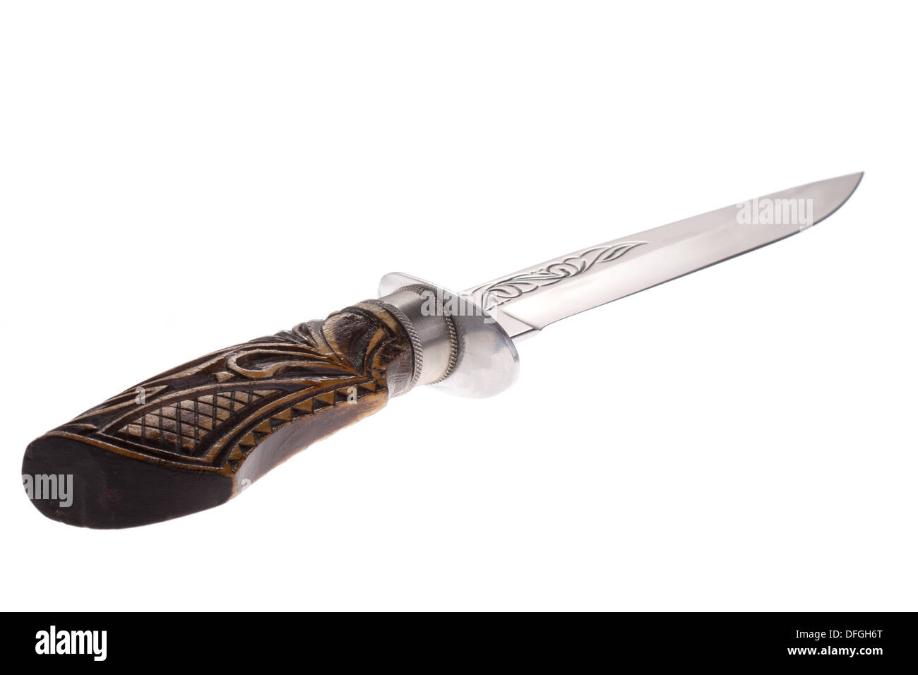 isolated dagger with a wooden handle and engraved blade Stock Photo Alamy