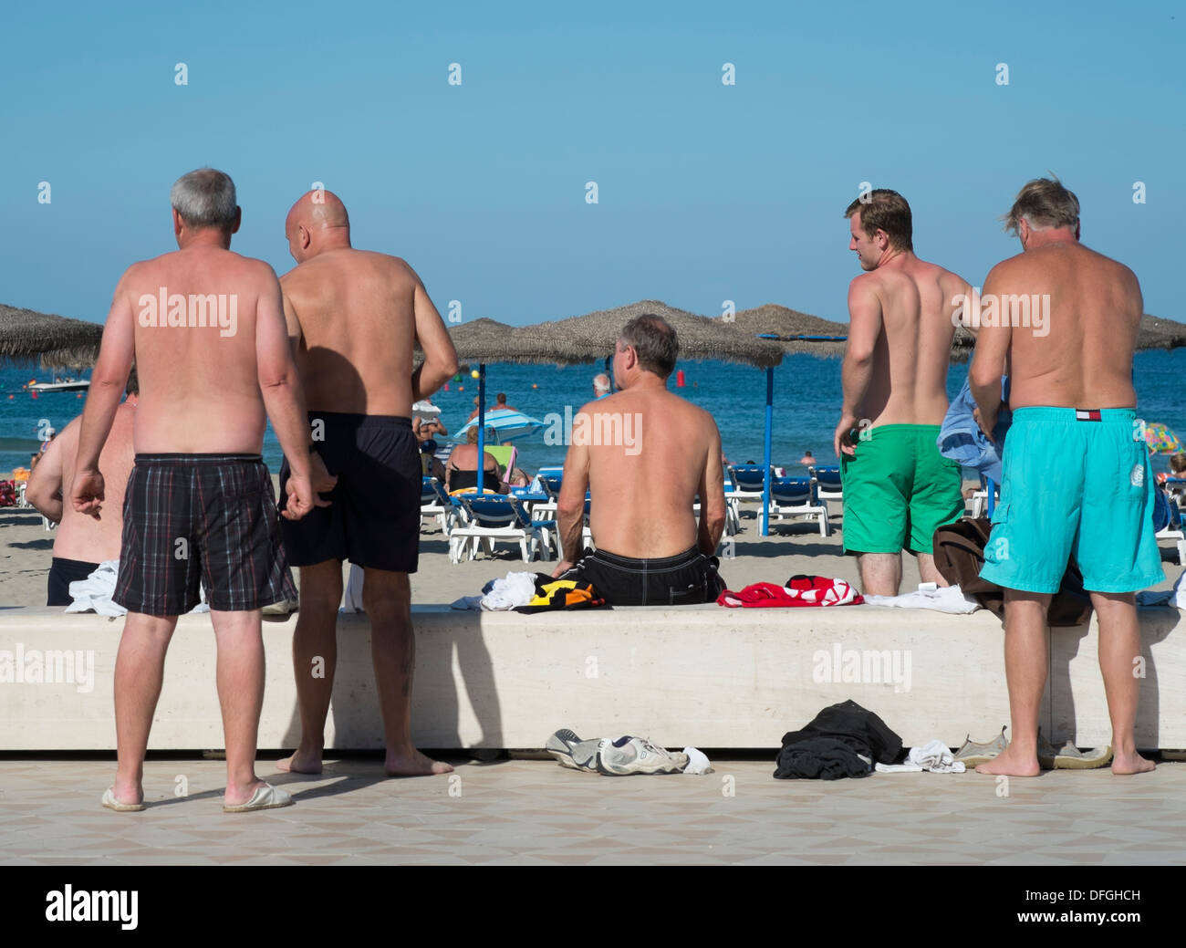 British tourists on the beach in Javea, Spain. Stock Photo